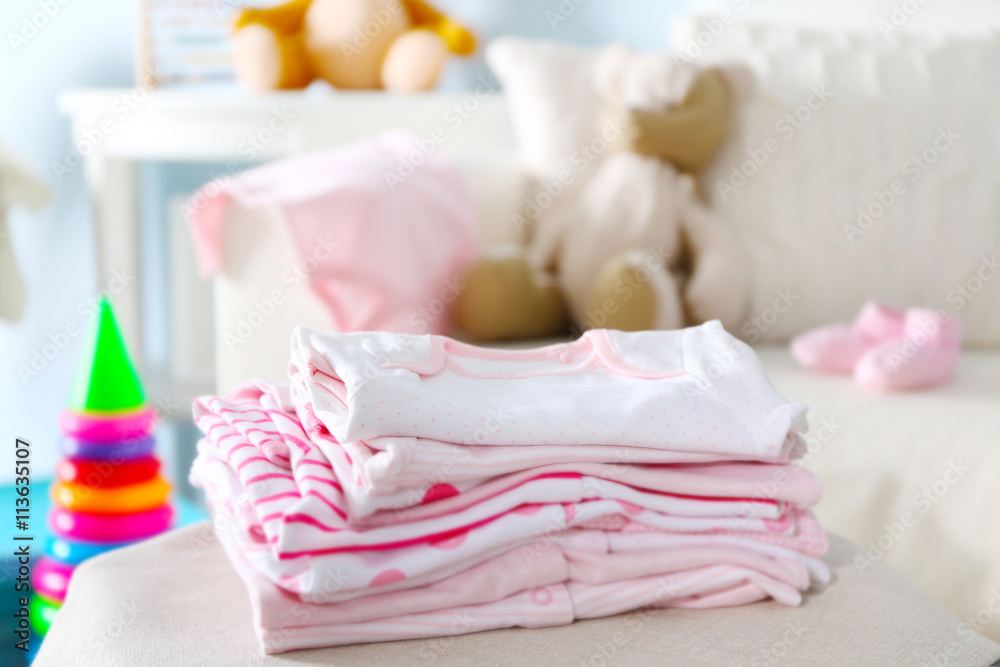 Pile of baby clothes, close up