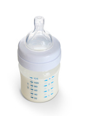 Fototapete - Baby milk bottle, isolated on white