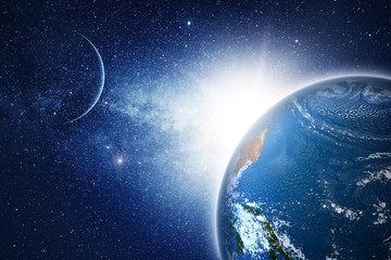 Wall Mural - earth planet with sunrise in space.