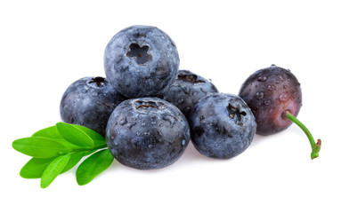 Wall Mural - Organic blueberry with leaf isolated on white.