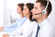 © rogerphoto - Young business man in headset. Call center