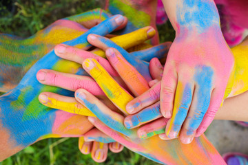 Wall Mural - Hands painted in different colors. Concept of love, friendship, happiness in family. 