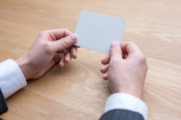 Wall Mural - businessman holding white blank paper