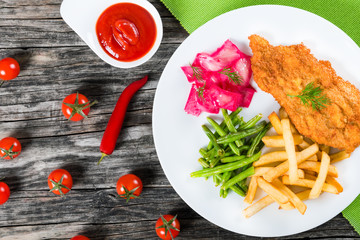 Poster - fried pork chop with french fries, green bean and salad