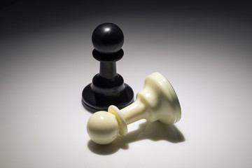 chess pawns, black and white