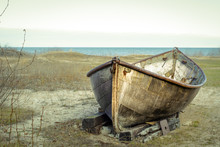 Rusty Boat On The Shore. Rusted Boat On The Remote Coast Of Lake Huron.