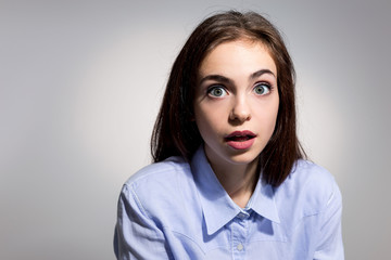 Wall Mural - Beautiful surprised girl portrait