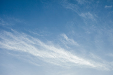 blurred clouds in the blue sky.