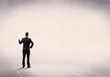 © ra2 studio - Business person standing in empty space