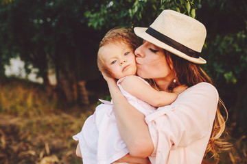 mother and daughter together outdoors