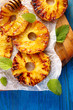 Grilled pineapple slices with addition of honey, top view