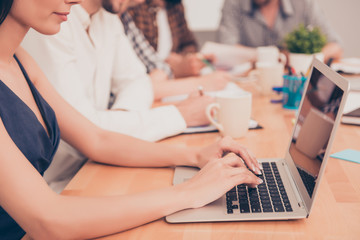 close-up photo of  beautiful businesswoman at conference table w