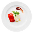 Caprese appetizer on plate isolated on white