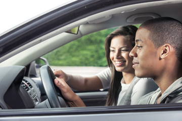 Teenagers driving car