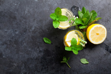 Wall Mural - Lemonade with lemon, mint and ice