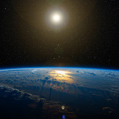 Wall Mural - sunlight reflects off the ocean from space. includes nasa data.