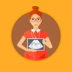 Canvas Print - Pregnant woman with ultrasound image.