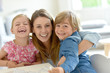 © goodluz - Portrait of cheerful mom with children