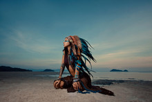 Indian Woman Outdoors At Sunset. Native American Style. Backgrou