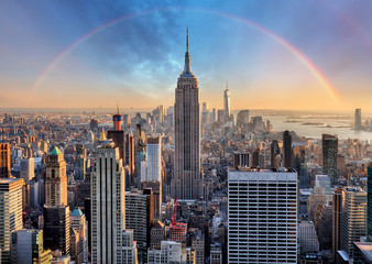 Wall Mural - New York City skyline with urban skyscrapers and rainbow.