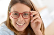 Portrait of beautiful young woman with eyeglasses