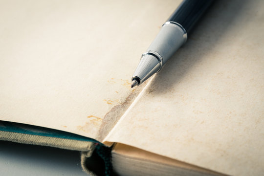 Vintage books and pen