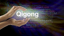 Gigong Word Cloud And Healing Hands - Female Cupped Hands With The Word QIGONG Between Surrounded By Word Cloud On A Multicolored Light Centered Dark Background