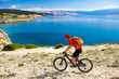 © blas - Mountain biker riding on bike in summer seaside