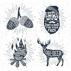 Hand drawn vintage badges set with textured acorns, bearded face, bonfire, and deer vector illustrations and inspirational lettering.