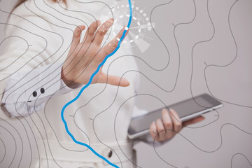 geographic information systems concept, woman scientist working with futuristic gis interface on a t