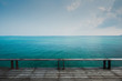 © peangdao - Old wooden deck and vats sea