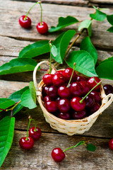 Wall Mural - Ripe cherries in a basket