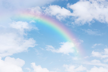 beautiful classic rainbow across in the blue sky after the rain