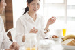 © Monet - Young couple is eating a breakfast happily