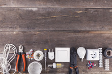 Electrical Tools And Equipment On Wooden Background With Copy Space