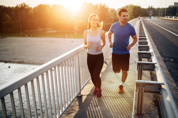 Wall Mural - Active couple jogging