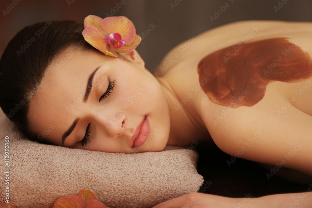 Beautiful young girl in spa salon