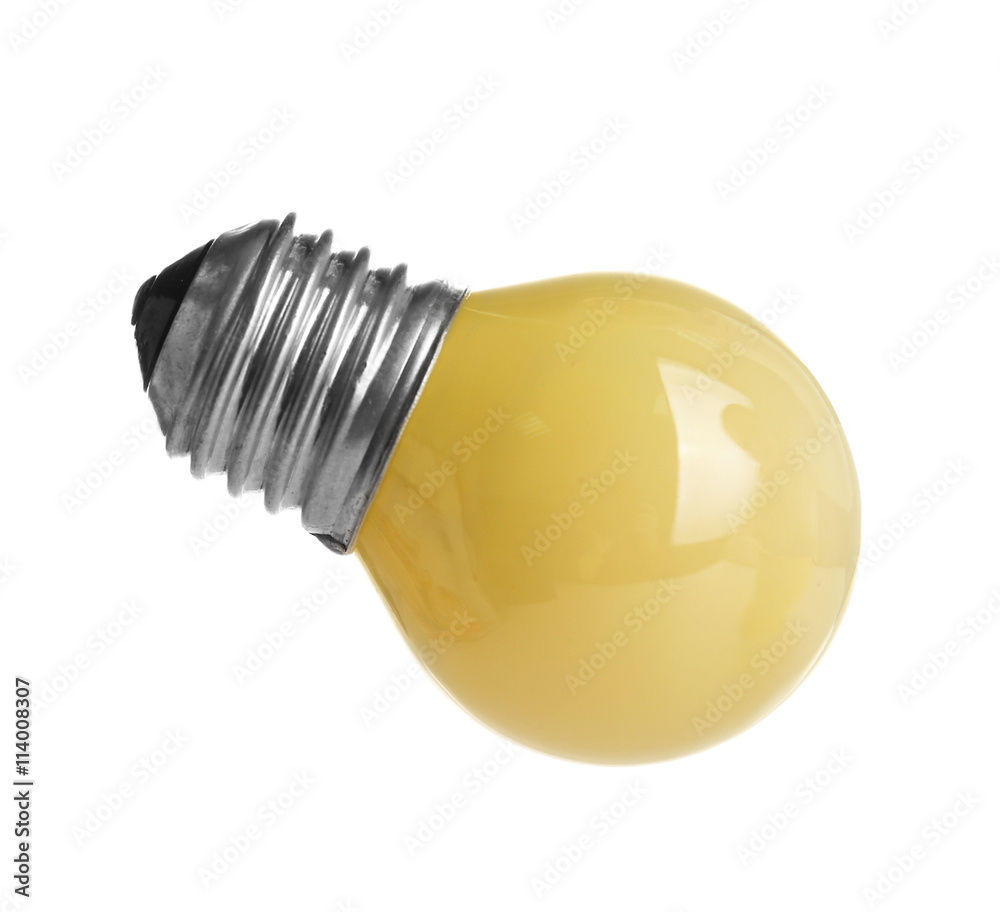 Decorative yellow light bulb, isolated on white