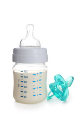 Fototapete - Baby milk bottle with pacifier, isolated on white