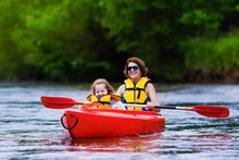 Mother And Child In A Kayak