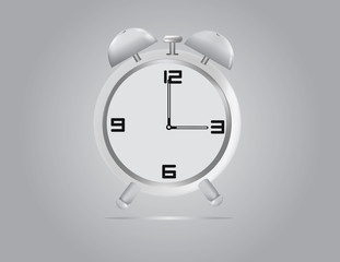 Classic alarm clock on white background