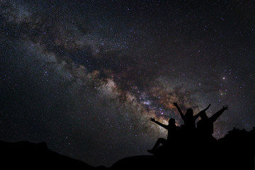 Wall Mural - landscape with milky way, night sky with stars and silhouette of