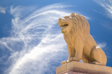 Carved Sandstone Lion On Blue Sky Backgroung
