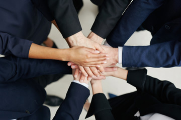 Poster - Business concept - group of business people joining hands