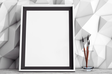 Poster - Blank Picture Frame with Brushes in front of Low Polygon Decorat