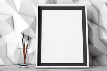Poster - Blank Picture Frame with Brushes in front of Low Polygon Decorat