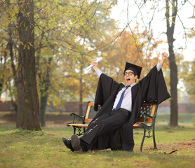 Sticker - Joyful student celebrating his graduation