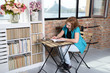 © dk_photo - woman reading a book on the chair near window