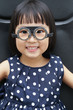 Leinwandbild Motiv Asian Little Chinese Girl Doing Eyes Examination