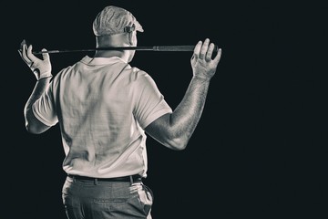 Poster - composite image of rear view of golf player holding a golf club